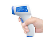 Misura accurata del chiaro del termometro dell'esposizione contatto infrarosso tenuto in mano non